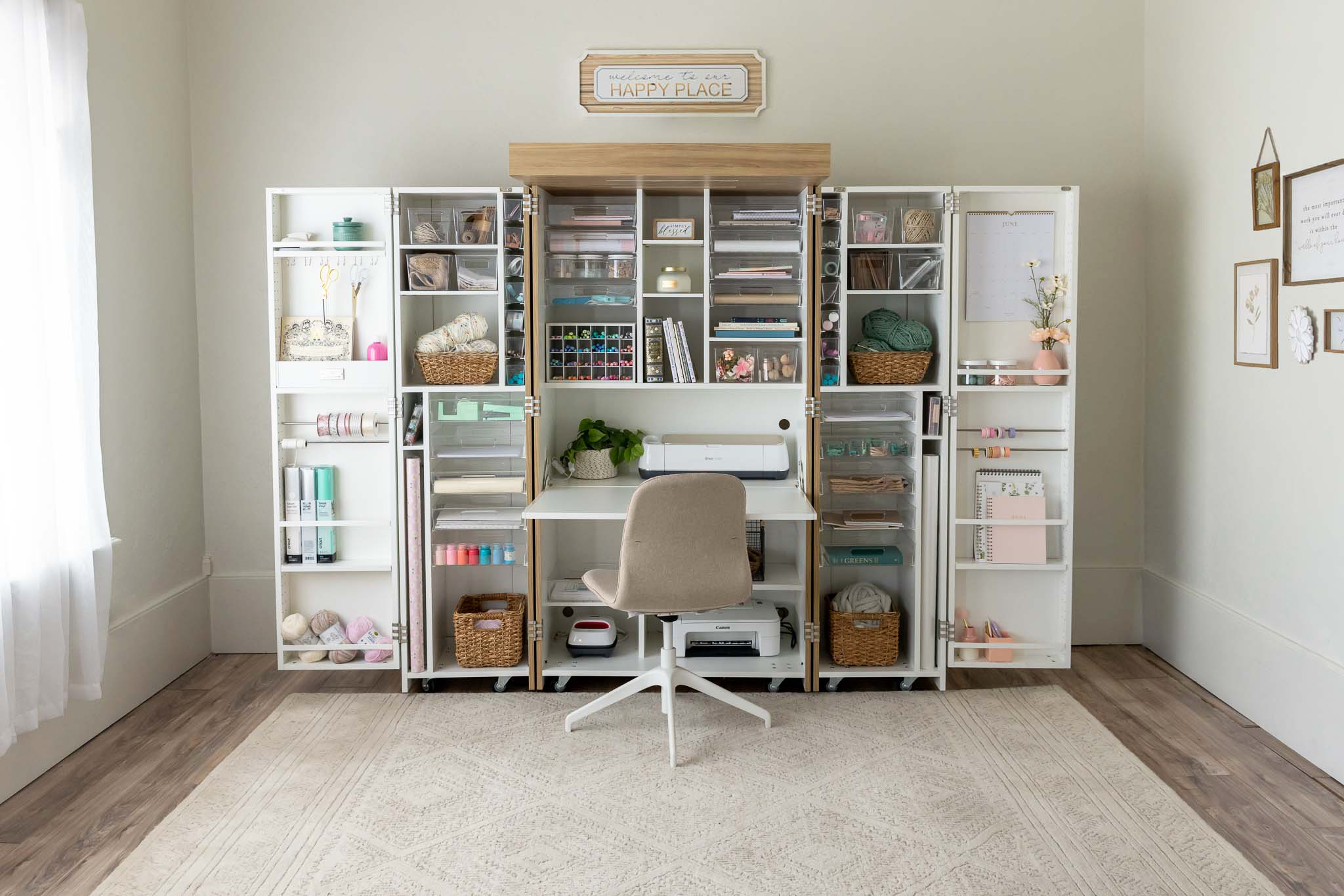 Create Room DreamBox fully open in craft room with storage totes and chair